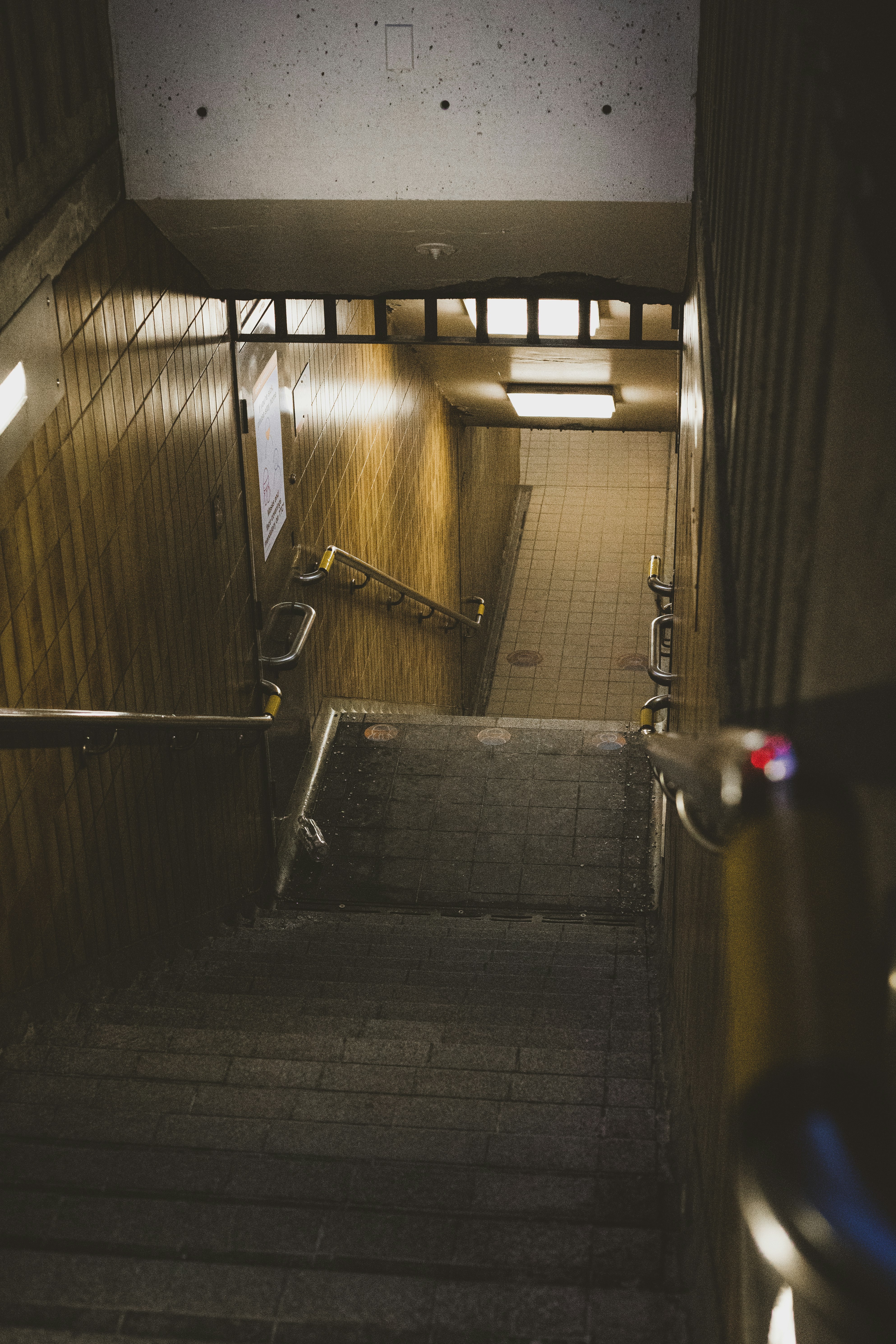 black and gray lamp on brown wooden staircase